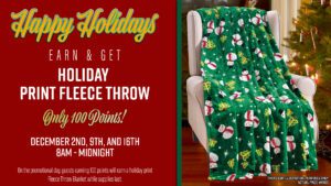 A promotional holiday-themed advertisement featuring an offer for a free holiday print fleece throw with points earned at a casino on certain dates.
